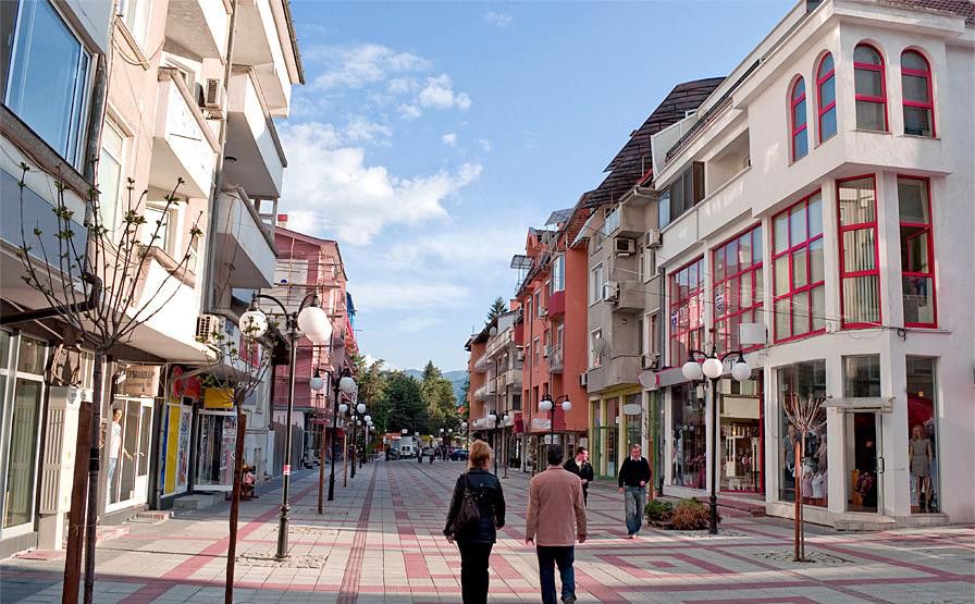 Pessoa em camelo no deserto